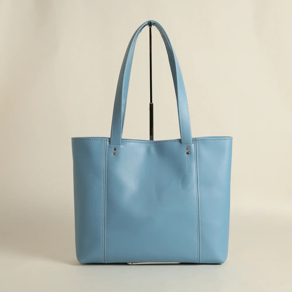 Boston minimalist leather tote in Wildflower Blue, handmade in Maine by Janell Bags